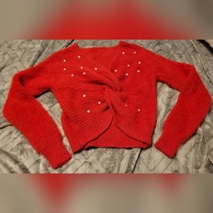 Red knitted sweater with perals
